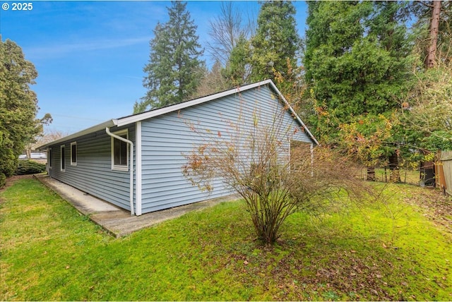 view of home's exterior featuring a lawn