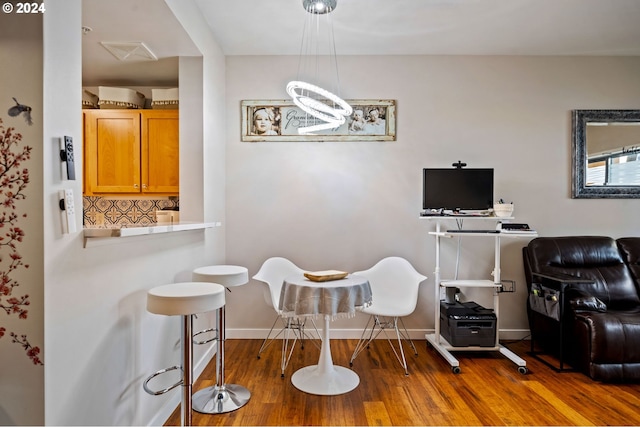 dining space featuring hardwood / wood-style flooring