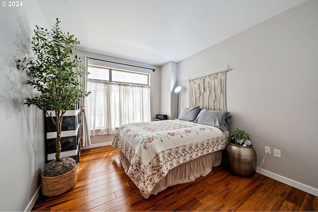 bedroom featuring wood-type flooring