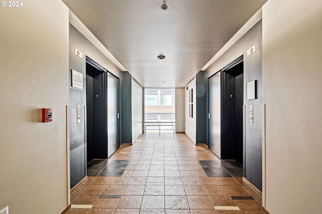 corridor featuring elevator