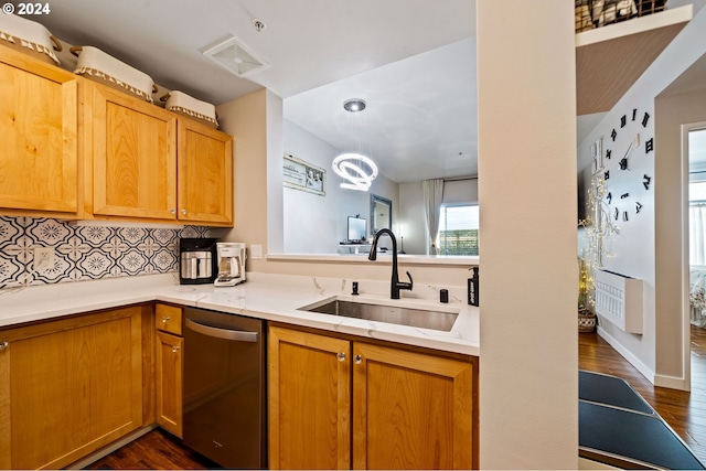 kitchen with decorative backsplash, sink, dishwasher, and dark hardwood / wood-style flooring