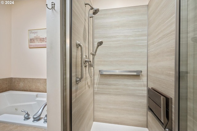 bathroom with independent shower and bath