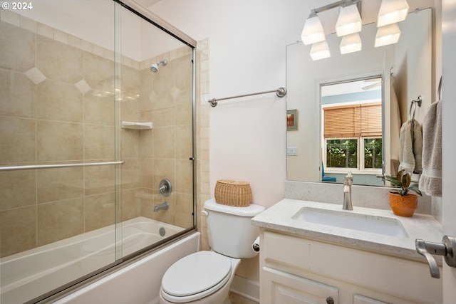 full bathroom with toilet, vanity, and combined bath / shower with glass door