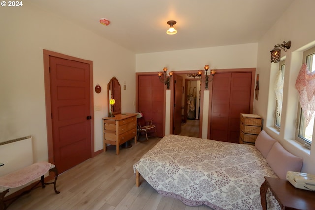 bedroom with light hardwood / wood-style floors