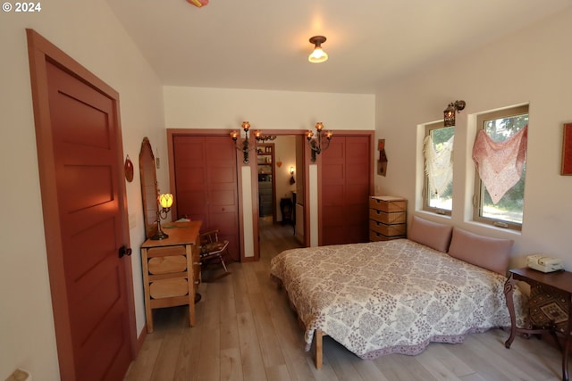 bedroom featuring light wood-type flooring