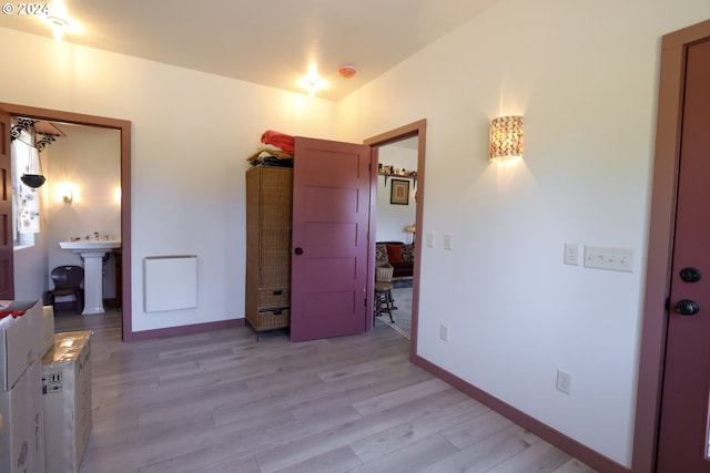 bedroom with light hardwood / wood-style floors