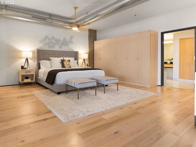 bedroom featuring light wood-type flooring