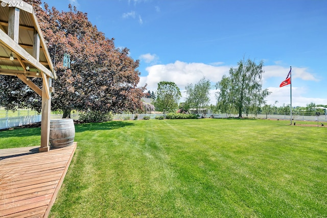 view of yard with a wooden deck