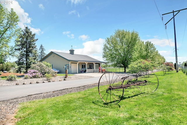 view of front of home with a front lawn