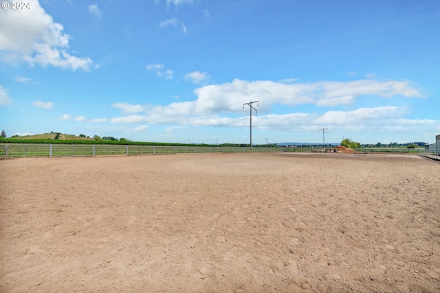 view of nearby features with a rural view