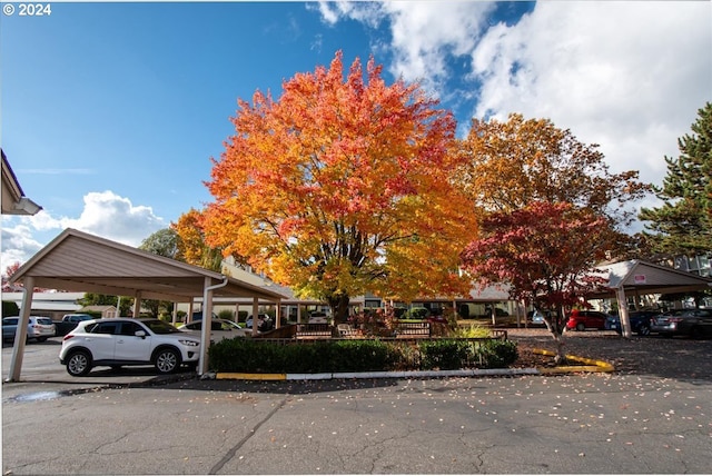 exterior space featuring a carport