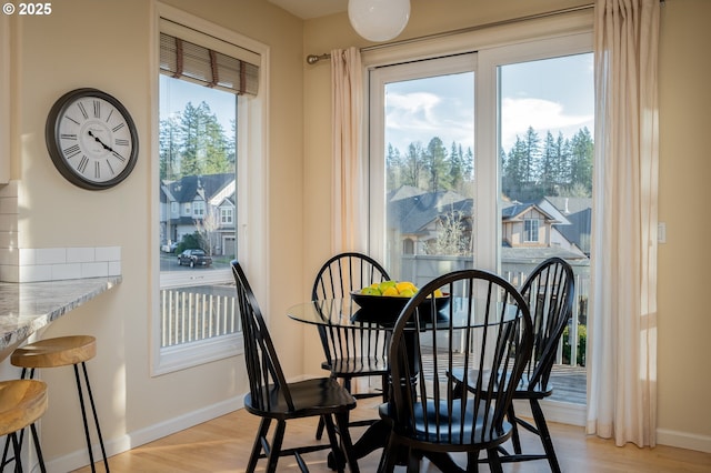 dining area featuring light hardwood / wood-style flooring