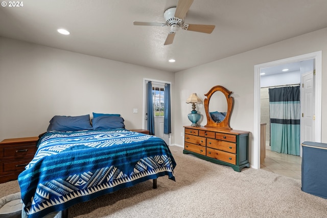 carpeted bedroom featuring ceiling fan