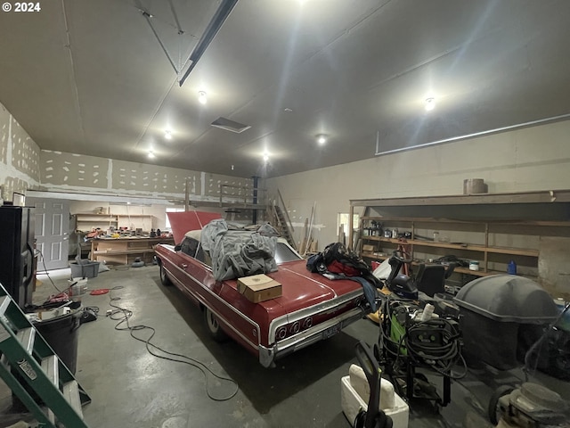 garage with a workshop area