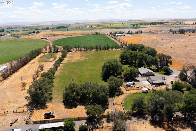 birds eye view of property featuring a rural view