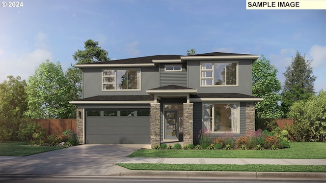 prairie-style home with a garage, fence, stone siding, concrete driveway, and a front lawn