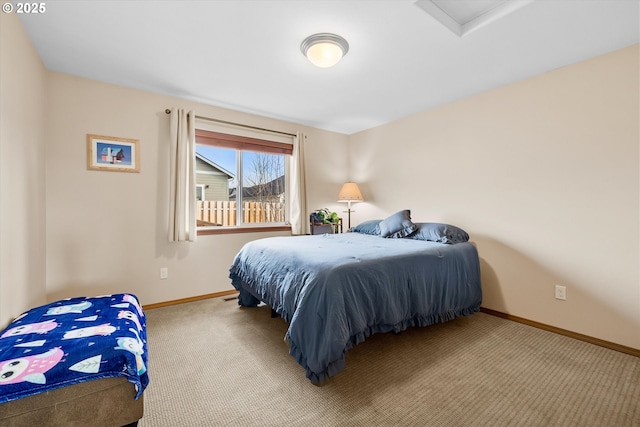 bedroom with light colored carpet