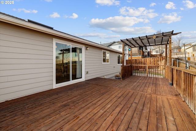 wooden terrace with a pergola