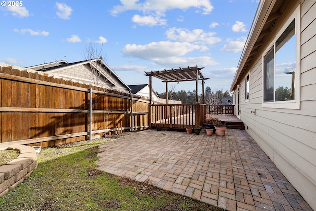 view of patio / terrace featuring a pergola and a wooden deck