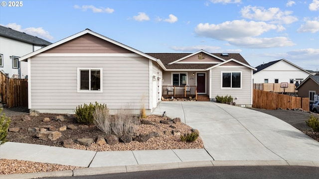 ranch-style home featuring covered porch