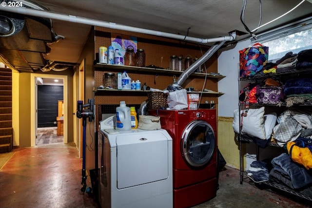 laundry room with washer and clothes dryer