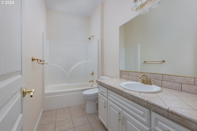 full bathroom with tile patterned floors, vanity, shower / tub combination, and toilet