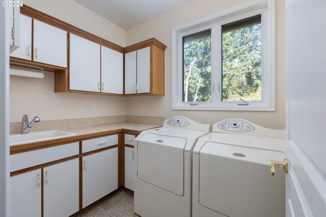 6605 Pacific Overlook Dr, Neskowin, OR 97149 - laundry room with cabinet space and washer and dryer