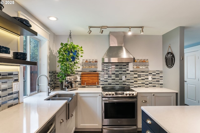 kitchen featuring open shelves, stainless steel range with electric stovetop, wall chimney exhaust hood, and light countertops