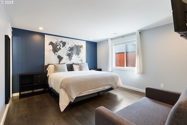 bedroom featuring recessed lighting, baseboards, and wood-type flooring