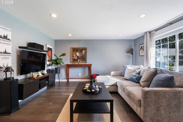 living room featuring dark wood-style floors, recessed lighting, and baseboards