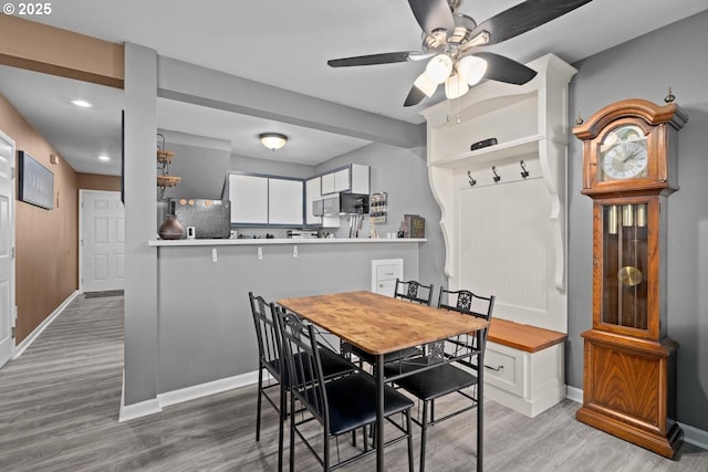 7143 SW Sagert St Unit 104, Tualatin, OR 97062 - dining area with a ceiling fan, wood finished floors, baseboards, and recessed lighting