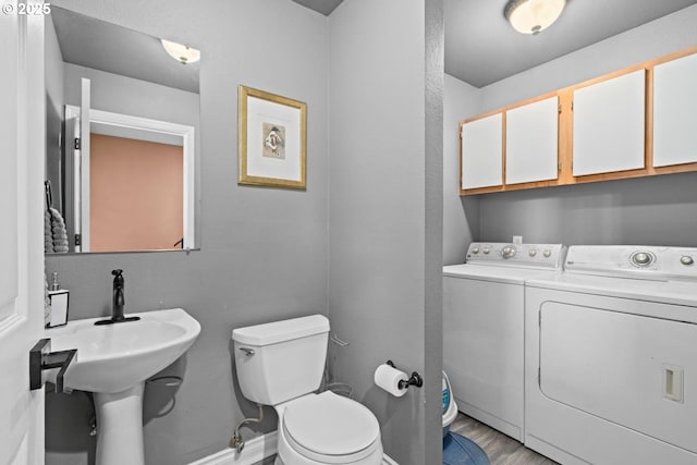 7143 SW Sagert St Unit 104, Tualatin, OR 97062 - half bath with washer and clothes dryer and toilet