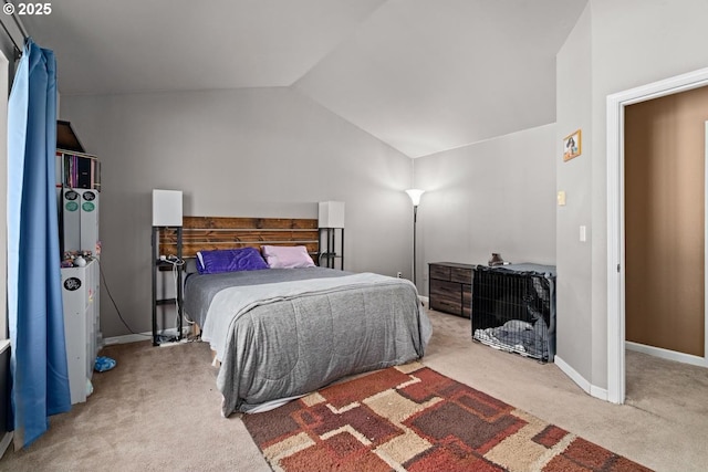 7143 SW Sagert St Unit 104, Tualatin, OR 97062 - bedroom with carpet, vaulted ceiling, and baseboards