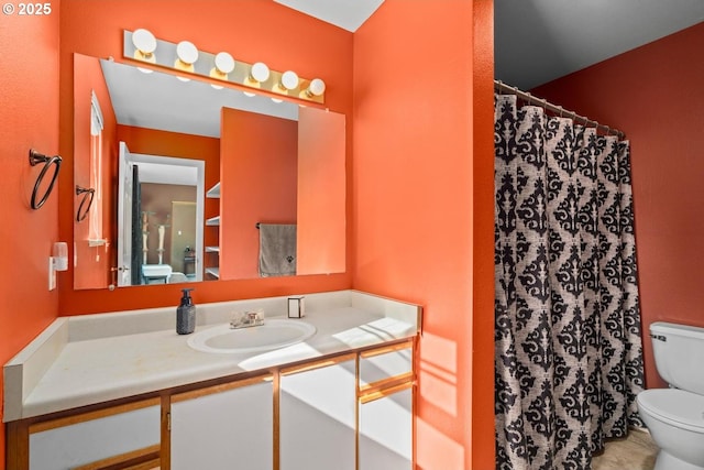 7143 SW Sagert St Unit 104, Tualatin, OR 97062 - full bathroom with toilet, vanity, and curtained shower