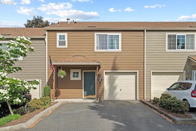 7143 SW Sagert St Unit 104, Tualatin, OR 97062 - townhome / multi-family property with a garage and driveway