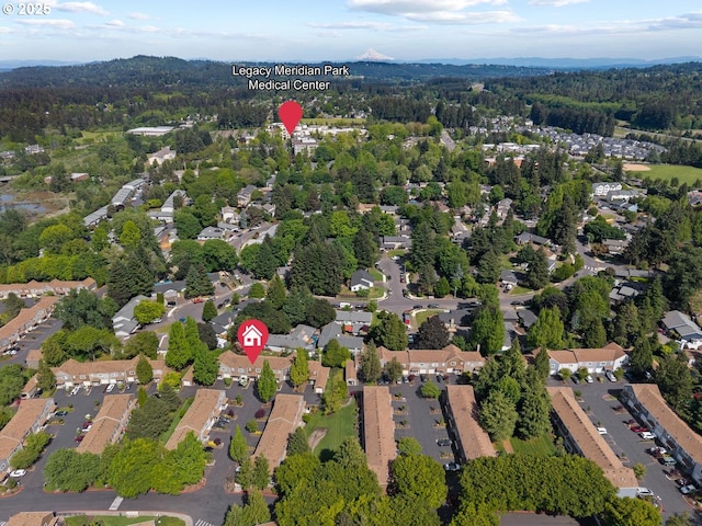 7143 SW Sagert St Unit 104, Tualatin, OR 97062 - aerial view of property's location featuring a forest