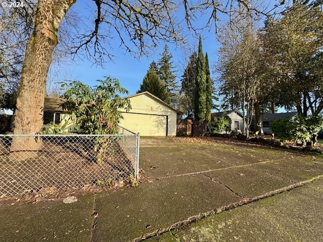 view of side of property with a garage