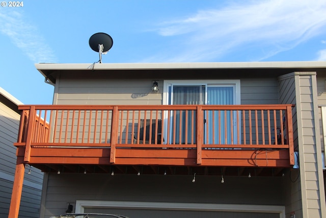 rear view of house featuring a balcony