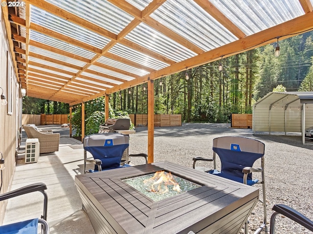 view of patio / terrace featuring a fire pit