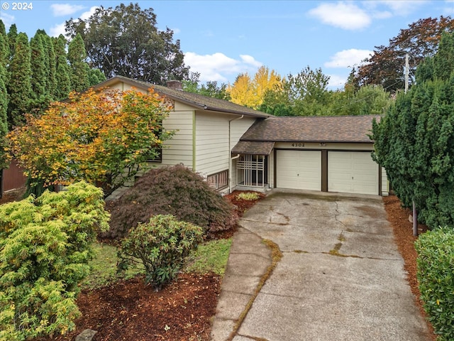 view of side of property featuring a garage