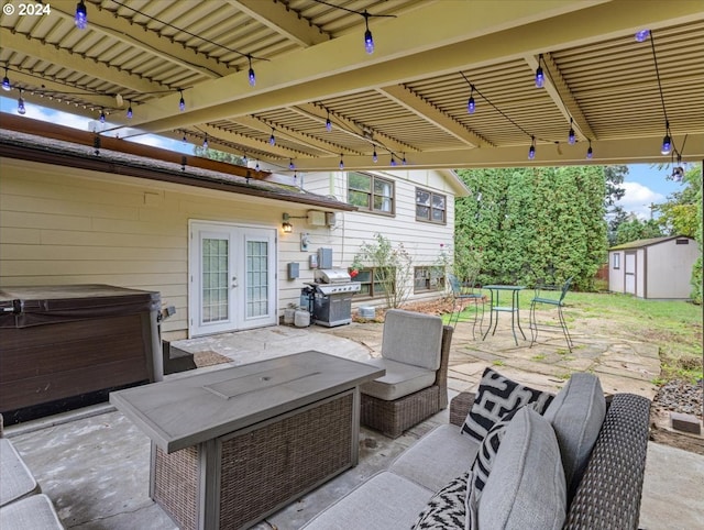 view of patio / terrace with a storage shed, a hot tub, a pergola, french doors, and a grill