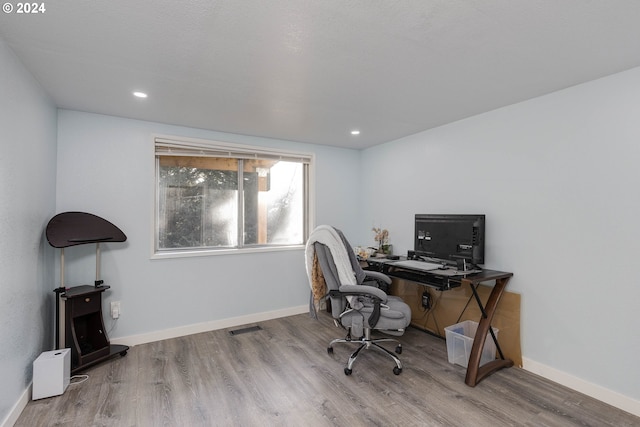 office with hardwood / wood-style floors