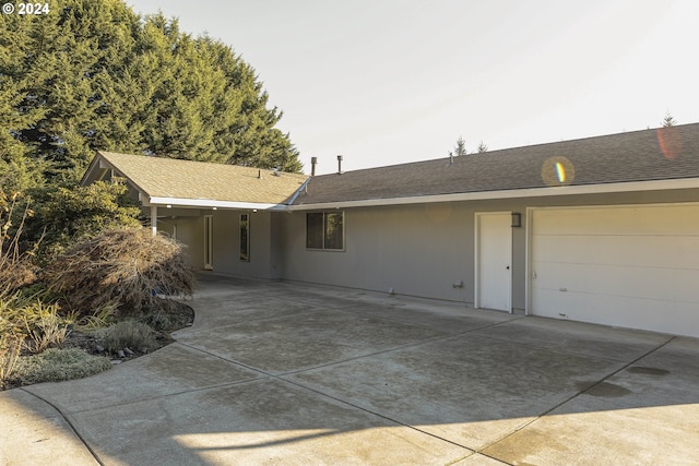 exterior space featuring a garage