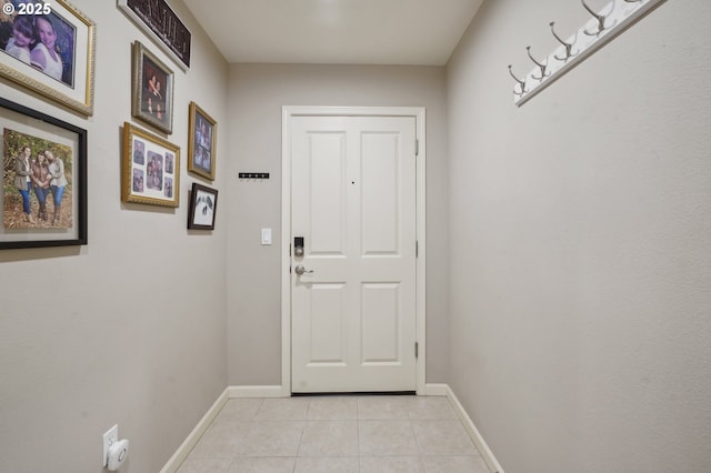 doorway featuring light tile patterned floors