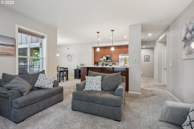 living room featuring light carpet