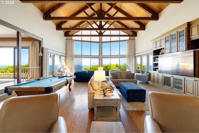 recreation room featuring beamed ceiling, high vaulted ceiling, dark wood-type flooring, and billiards