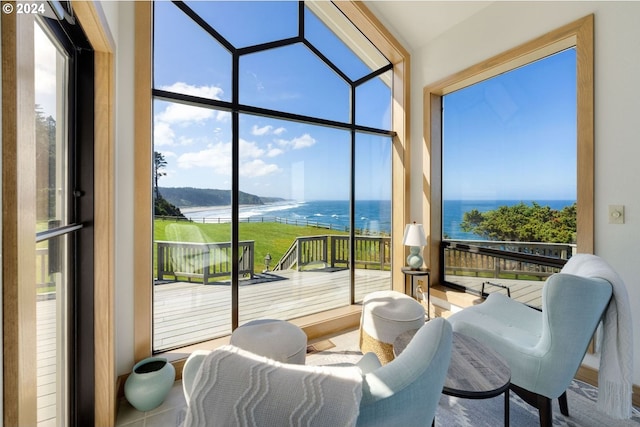 sunroom with a water view