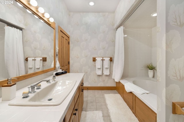 bathroom featuring tile patterned flooring and vanity