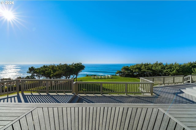 deck featuring a water view