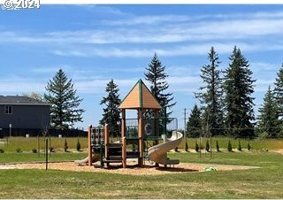 view of playground featuring a yard